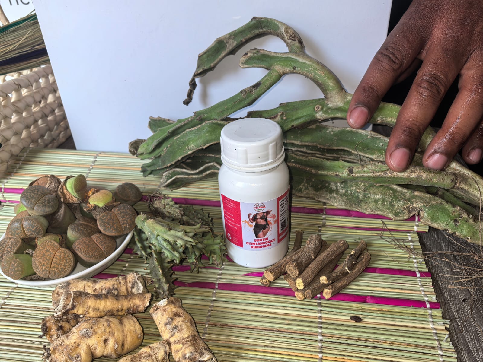 Imvelo Healing Herbs product lineup in a warm lifestyle setting